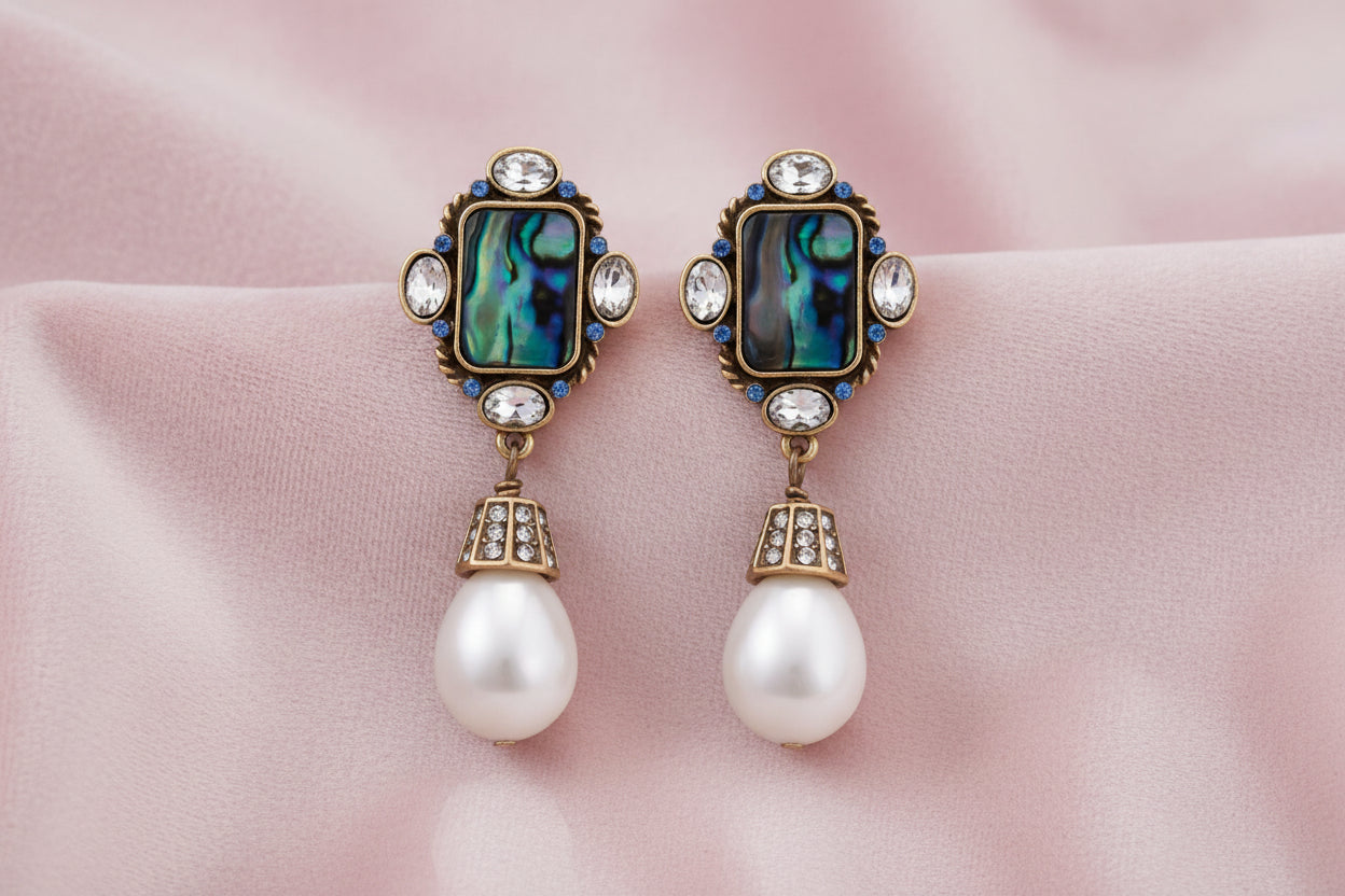 Ornate gold-plated drop earrings with rectangular abalone shell centers, crystal accents, and baroque pearl drops
