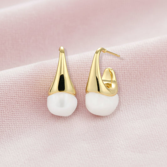 Pair of small gold-plated hoop earrings with triangular cone fronts and curved backs on white background.